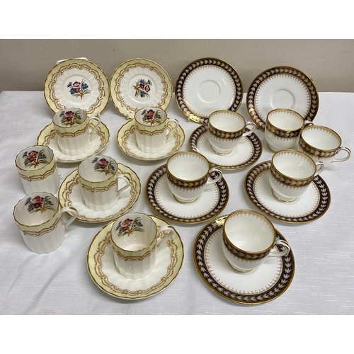 143 - Two coffee services to include Royal Worcester 'Cromwell' pattern and Wedgwood. Each set includes si... 