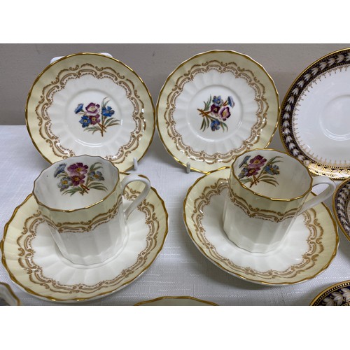 143 - Two coffee services to include Royal Worcester 'Cromwell' pattern and Wedgwood. Each set includes si... 