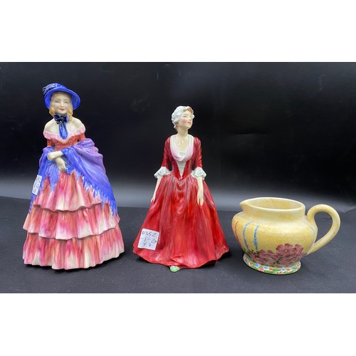 145 - Two Royal Doulton figurines 'Victorian Lady' and 'Gwyneth' reg. no. 842846 and a small Radford jug.