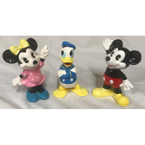 127 - Walt Disney Productions Figurines Mickey, Minnie and Donald Duck, approx 10cms high.