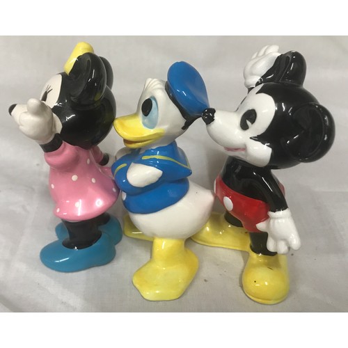 127 - Walt Disney Productions Figurines Mickey, Minnie and Donald Duck, approx 10cms high.