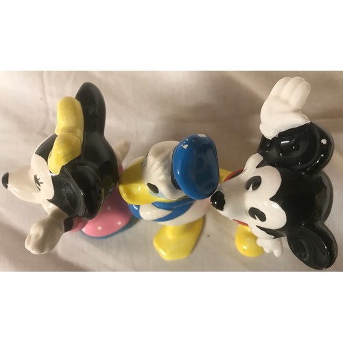 127 - Walt Disney Productions Figurines Mickey, Minnie and Donald Duck, approx 10cms high.