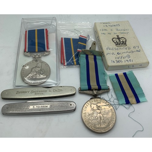 699 - A Royal Observer Corps medal awarded to C. Obs E. Pearson together with a National Service medal and... 