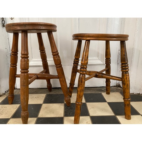 1197 - Two 19thC wooden stools. 51 and 45.5cm high.