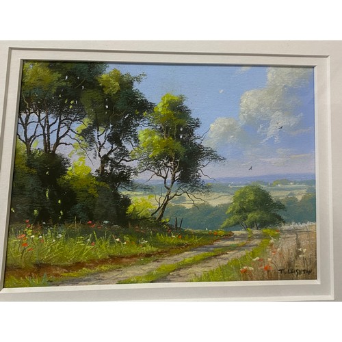 1107 - Two framed and mounted contemporary watercolours of rural landscapes both signed T. Leighton togethe... 