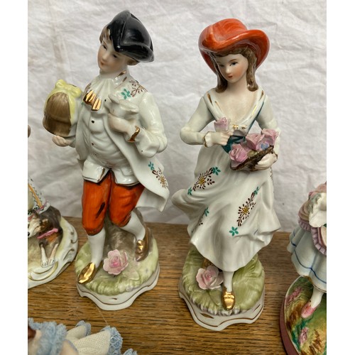 151 - Selection of continental pottery figurines, 20cm h, including one Dresden lace dress, figure 12cm.