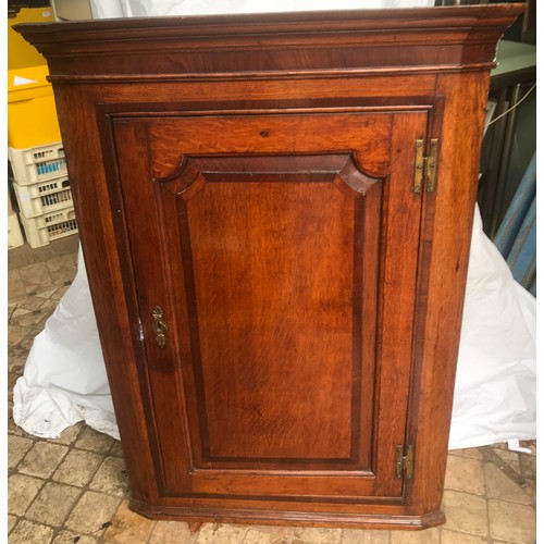 1185 - A 19thC oak inlaid corner cabinet. 74 w x 40 d x 107cm h.