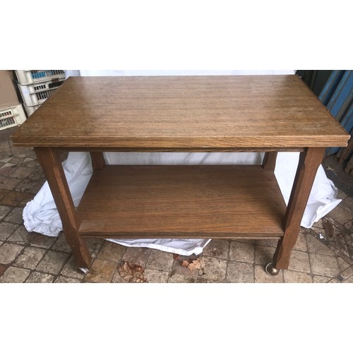 1187 - Oak trolley serving table on castors. 80 w x 44 d x 61cm h.