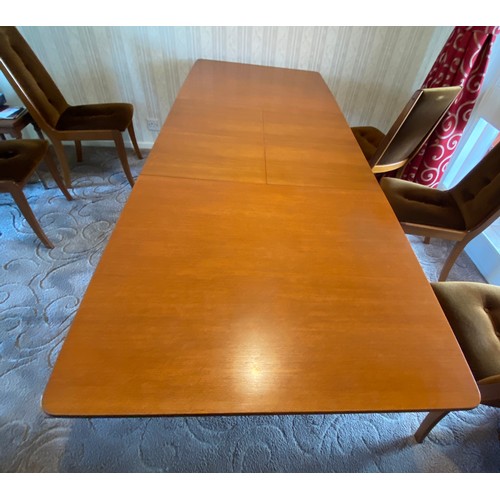 1190 - A Mcintosh vintage teak wood extendable dining table of rectangular form with six upholstered teak c... 