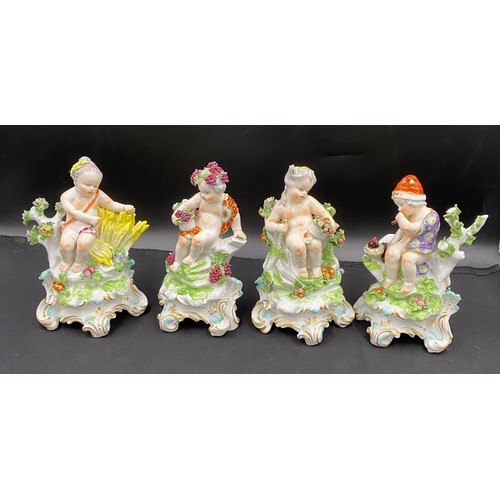 162 - Four porcelain cherub figurines depicting the four seasons with gold anchor mark to rear. 21cm h.