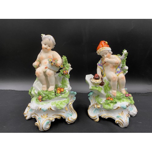 162 - Four porcelain cherub figurines depicting the four seasons with gold anchor mark to rear. 21cm h.