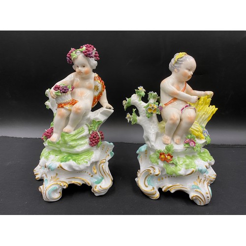 162 - Four porcelain cherub figurines depicting the four seasons with gold anchor mark to rear. 21cm h.