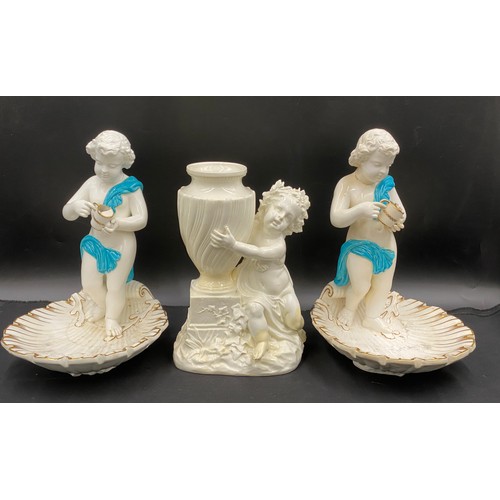 164 - Pair of Continental cherub dishes 30cms high, together with a C19th Minton cherub vase 25cms high.