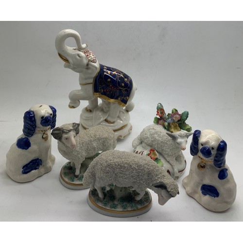 168 - Six various 19thC/ early 20thC ceramic animals to include dogs, sheep and an elephant 14cm h.