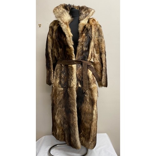 495 - A long length vintage wolf fur coat with suede belt approx. Size 12. Length from shoulder to hem app... 