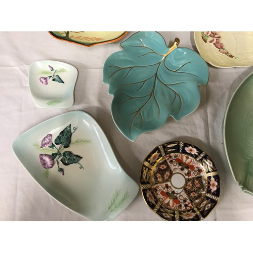 176 - A selection of Carlton Ware to include various Australian design dishes, painted fruit bowl with tri... 