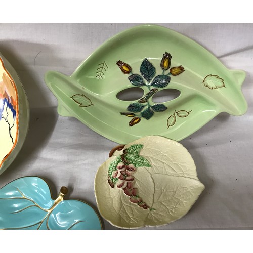 176 - A selection of Carlton Ware to include various Australian design dishes, painted fruit bowl with tri... 