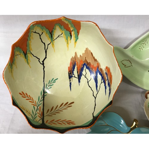 176 - A selection of Carlton Ware to include various Australian design dishes, painted fruit bowl with tri... 