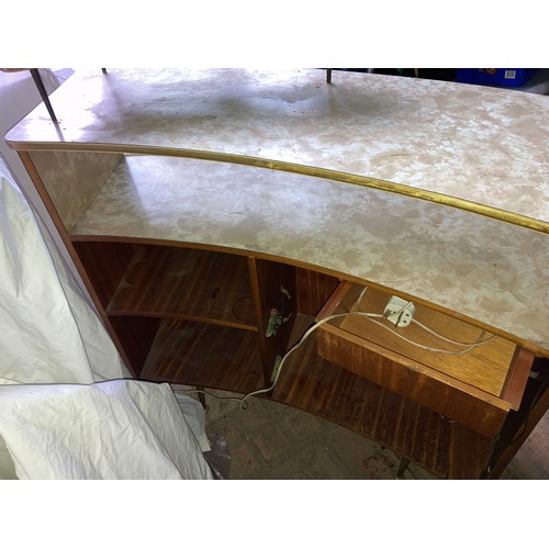 1198 - A mid century formica topped bow front bar with top shelf and back draw. 114 w x 107 h x 46cm d appr... 