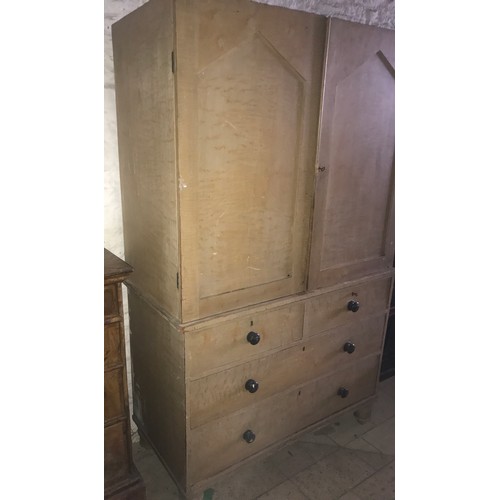 1204 - Pine linen press, two door cupboard top, 2 over 2 drawer base, turned wooden bun handles, locks to d... 