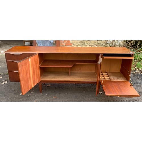 1205 - A Mcintosh sideboard, three drawers and two cupboard, one dropdown with slide out shelf. 201 l x 45 ... 