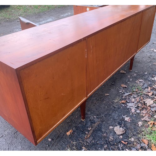 1205 - A Mcintosh sideboard, three drawers and two cupboard, one dropdown with slide out shelf. 201 l x 45 ... 