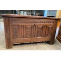 An oak coffer with internal candle box and 2 zinc lined compartments, carved to front. 119 w x 58 d ... 