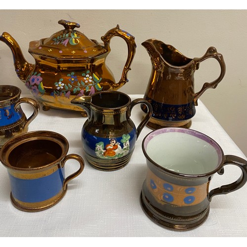 115 - 19thC Copper lustre ware to include 7 x jugs, 2 x teapots and 2 x mugs.