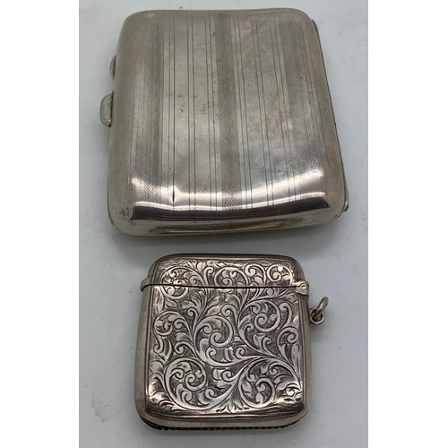 442 - Silver cigarette case Birmingham 1918 J C Ltd together with a silver vesta case Birmingham 1921 with... 