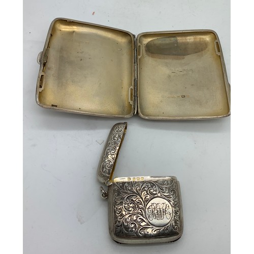 442 - Silver cigarette case Birmingham 1918 J C Ltd together with a silver vesta case Birmingham 1921 with... 