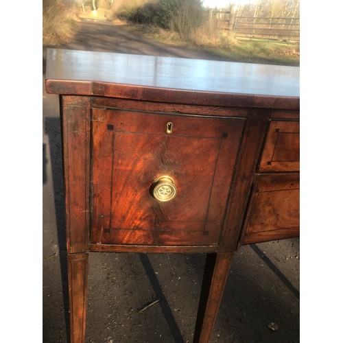 1133 - A 19thC mahogany bow front inlaid sideboard with cellarette drawer. 57 d x 137 w x 91cm h.