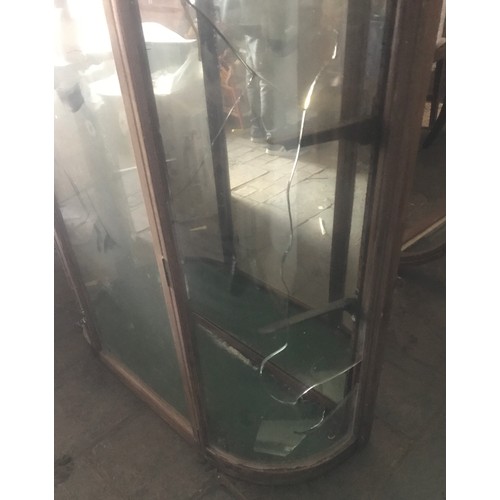 1134 - Mahogany bow front mirror backed display cabinet for restoration. 100 w x 31 d x 120cm h.