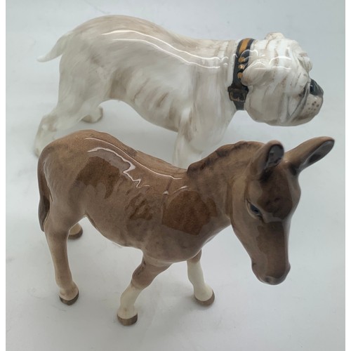 125 - A Beswick donkey together with a Royal Doulton bulldog.