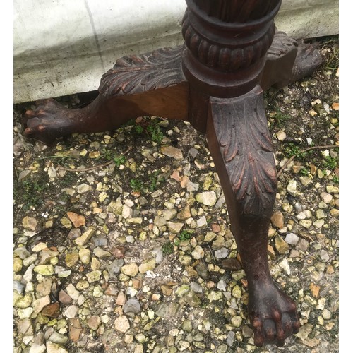 1123 - Tall mahogany carved stem torchere stand on tripod claw and ball feet. 145cm h.