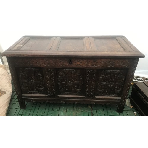 1128 - Eighteenth century oak coffer, carved panels to front, 123 w 60 d x 71cm h.