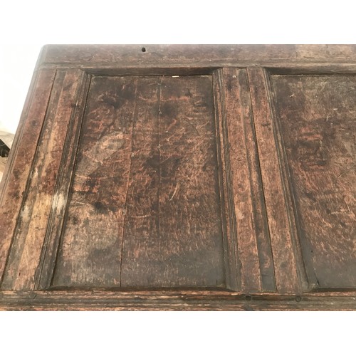 1128 - Eighteenth century oak coffer, carved panels to front, 123 w 60 d x 71cm h.