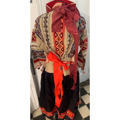 506 - Vintage Russian folk costume to include silk skirt, apron, shirt headdress together with a silk embr... 