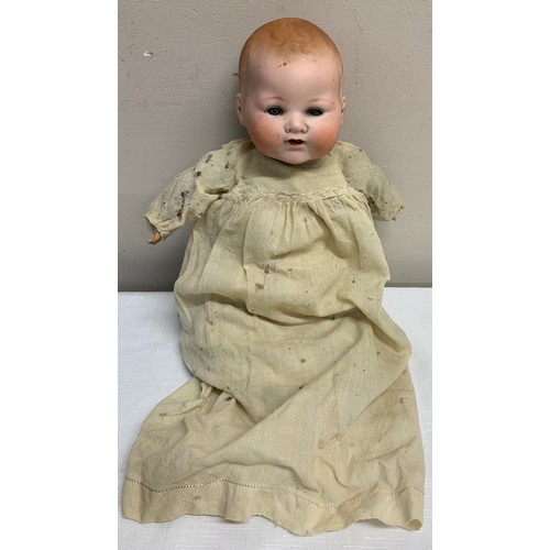 704 - Bisque headed Armand Marseille doll with closing blue eye and open mouth with cloth body and plastic... 