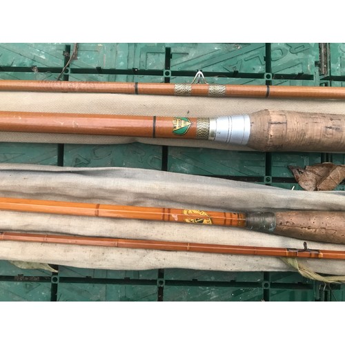 771 - Fly fishing rods, A E Rudge cane 2 piece 11ft and a Wells Rods fibre glass 2 piece 10ft. With bags a... 