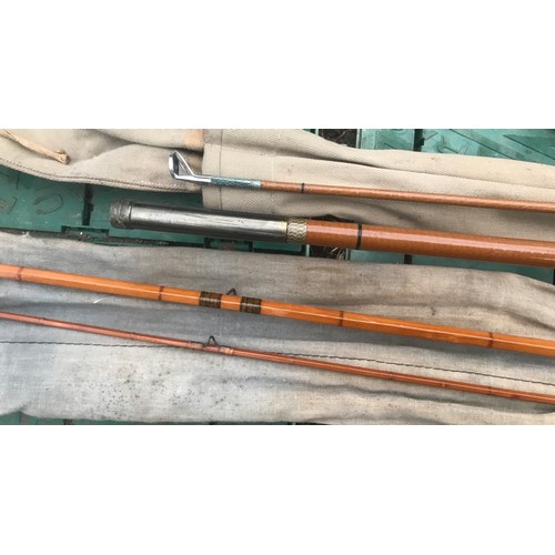 771 - Fly fishing rods, A E Rudge cane 2 piece 11ft and a Wells Rods fibre glass 2 piece 10ft. With bags a... 