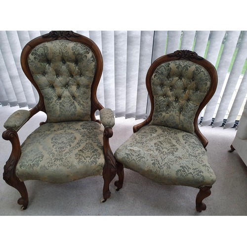 1150 - Two 19thC walnut framed chairs, one an open armchair, the other a nursing chair, both with button ba... 