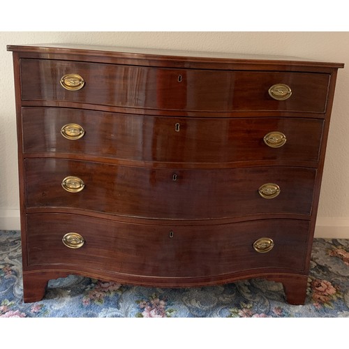 1158 - A mahogany and string inlaid serpentine fronted chest of 4 drawers on bracket feet and brass drop ha... 