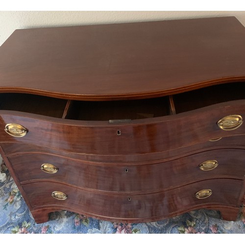 1158 - A mahogany and string inlaid serpentine fronted chest of 4 drawers on bracket feet and brass drop ha... 