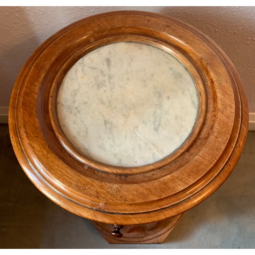 1169 - A 19thC mahogany pot cupboard with marble top. 70cm h.