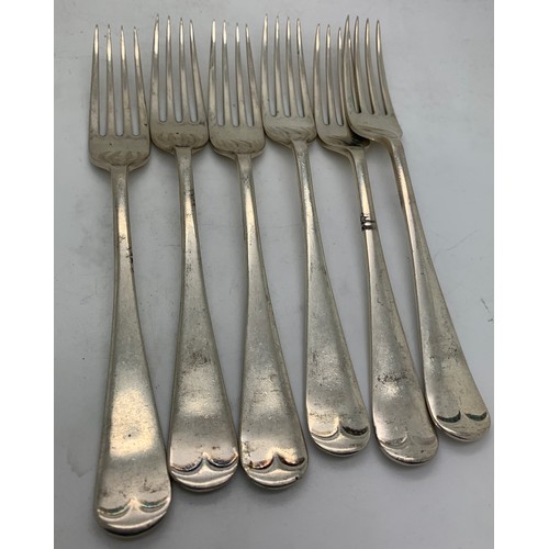 445 - Six silver dessert spoons and six dessert forks Sheffield 1930 R F Mosley and Co. Total weight 620.4... 