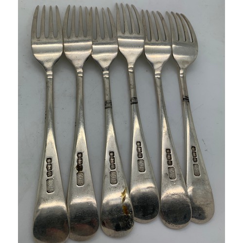 445 - Six silver dessert spoons and six dessert forks Sheffield 1930 R F Mosley and Co. Total weight 620.4... 