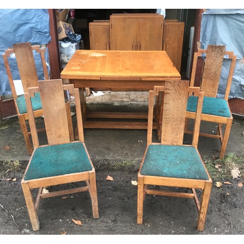 1173 - An Art Deco oak dining room suite, draw leaf table 106 w x closed 91cm x 76cm h, 4 chairs and a side... 