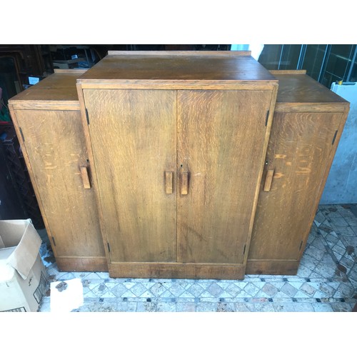 1173 - An Art Deco oak dining room suite, draw leaf table 106 w x closed 91cm x 76cm h, 4 chairs and a side... 