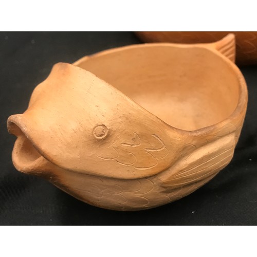 92 - Pottery casserole dish in the form of a fish with sauce jug dish, approx 32cm l, jug 18cm l together... 