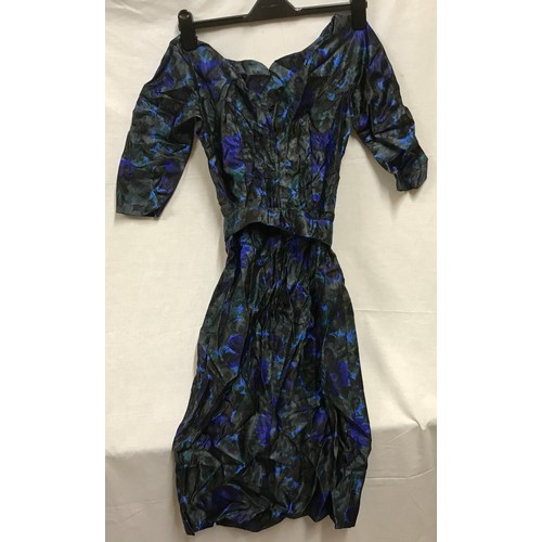 510 - A 1950's handmade silk dress, blue and green floral design with a belt. Length 101cm, waist approx. ... 